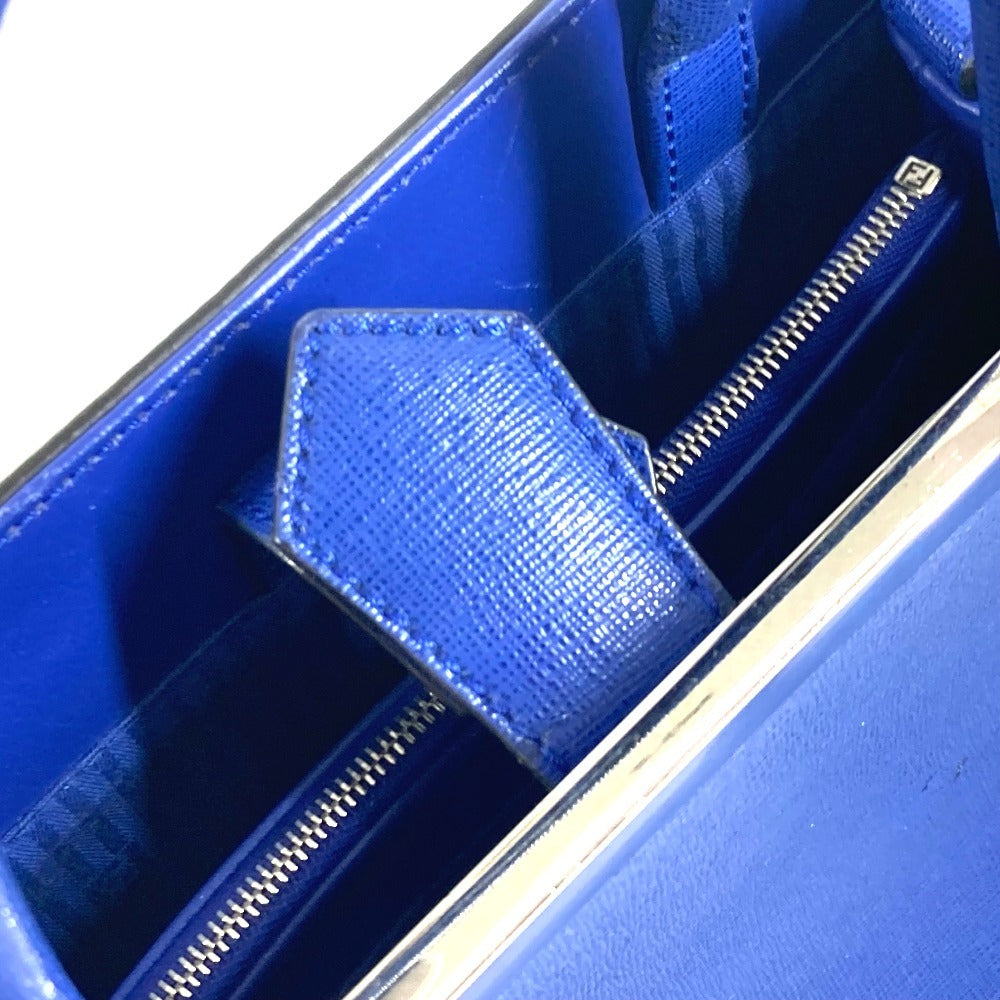 Close-up of a blue handbag with a zipper detail