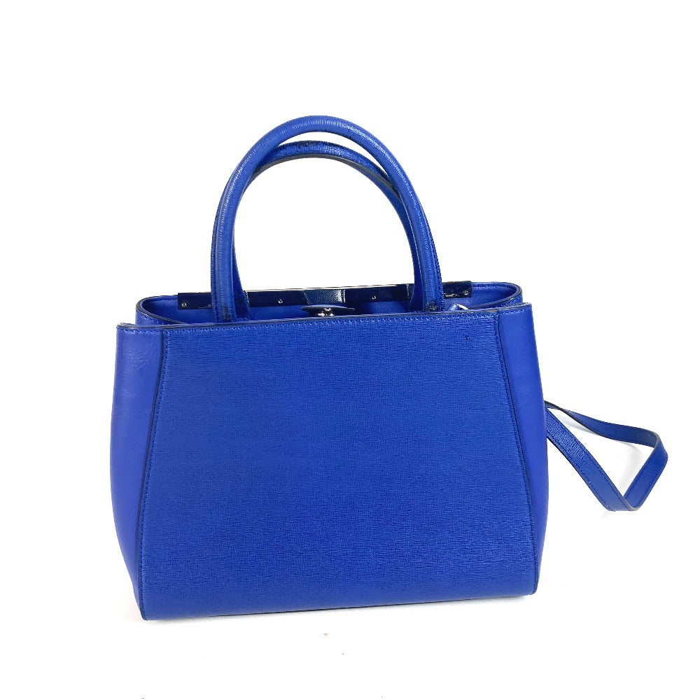 Blue handbag with a strap on a white background