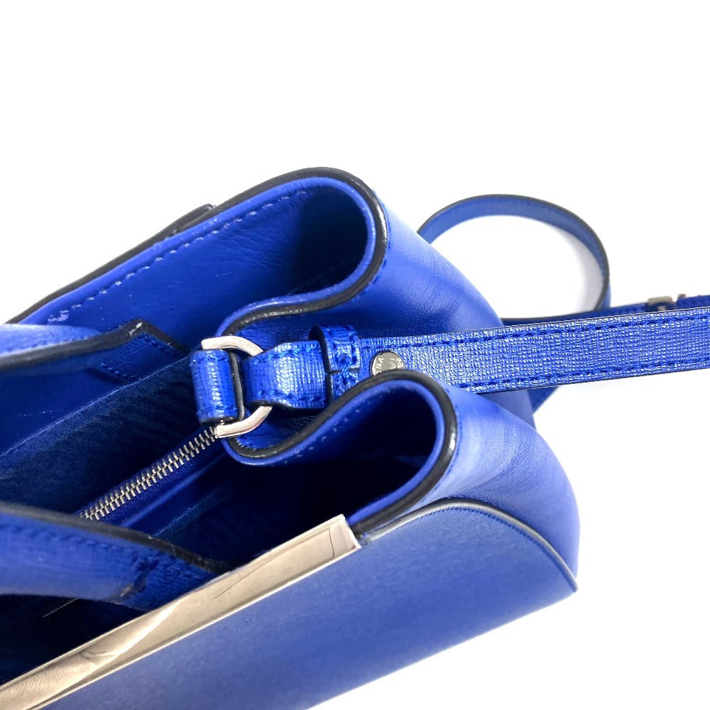 Blue handbag with a strap on a white background