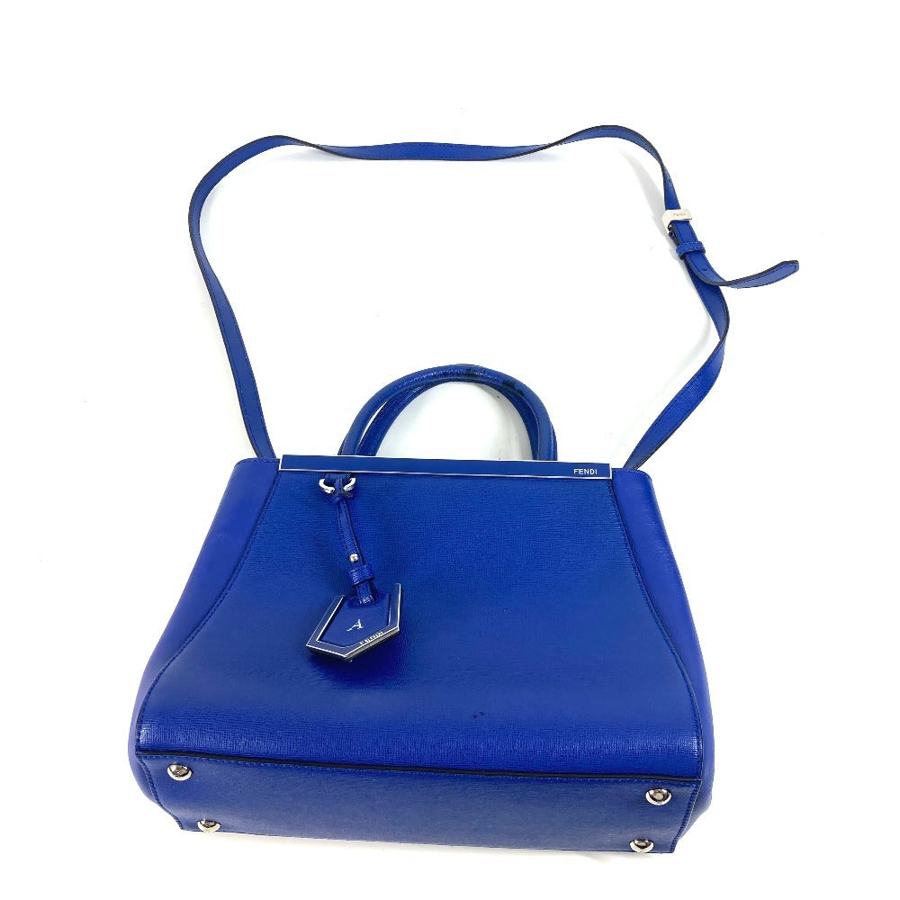 Blue handbag with a strap on a white background
