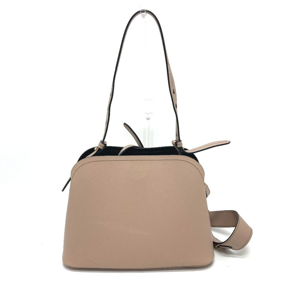 Beige handbag with a strap on a white background