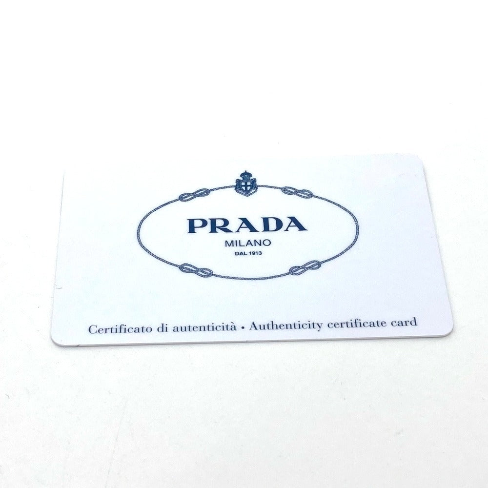 Prada authenticity certificate card on a white background