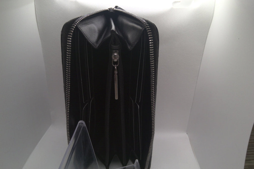Black wallet with multiple card slots on a white background