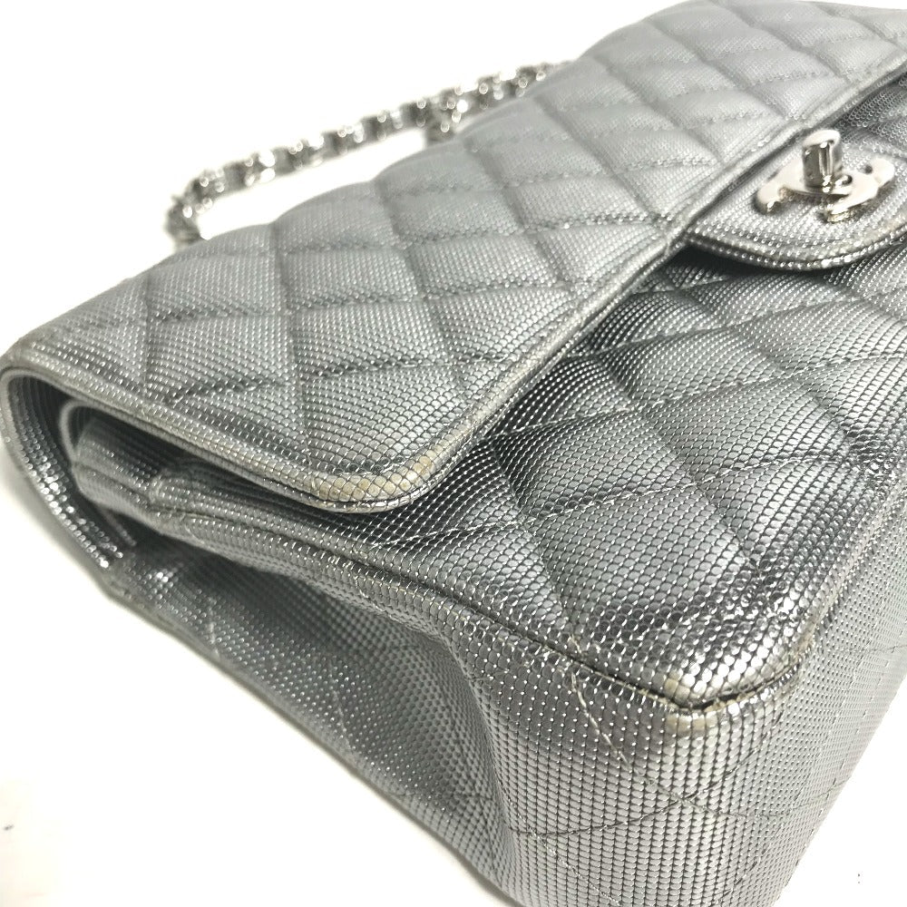 Silver quilted handbag with a chain strap on a white background