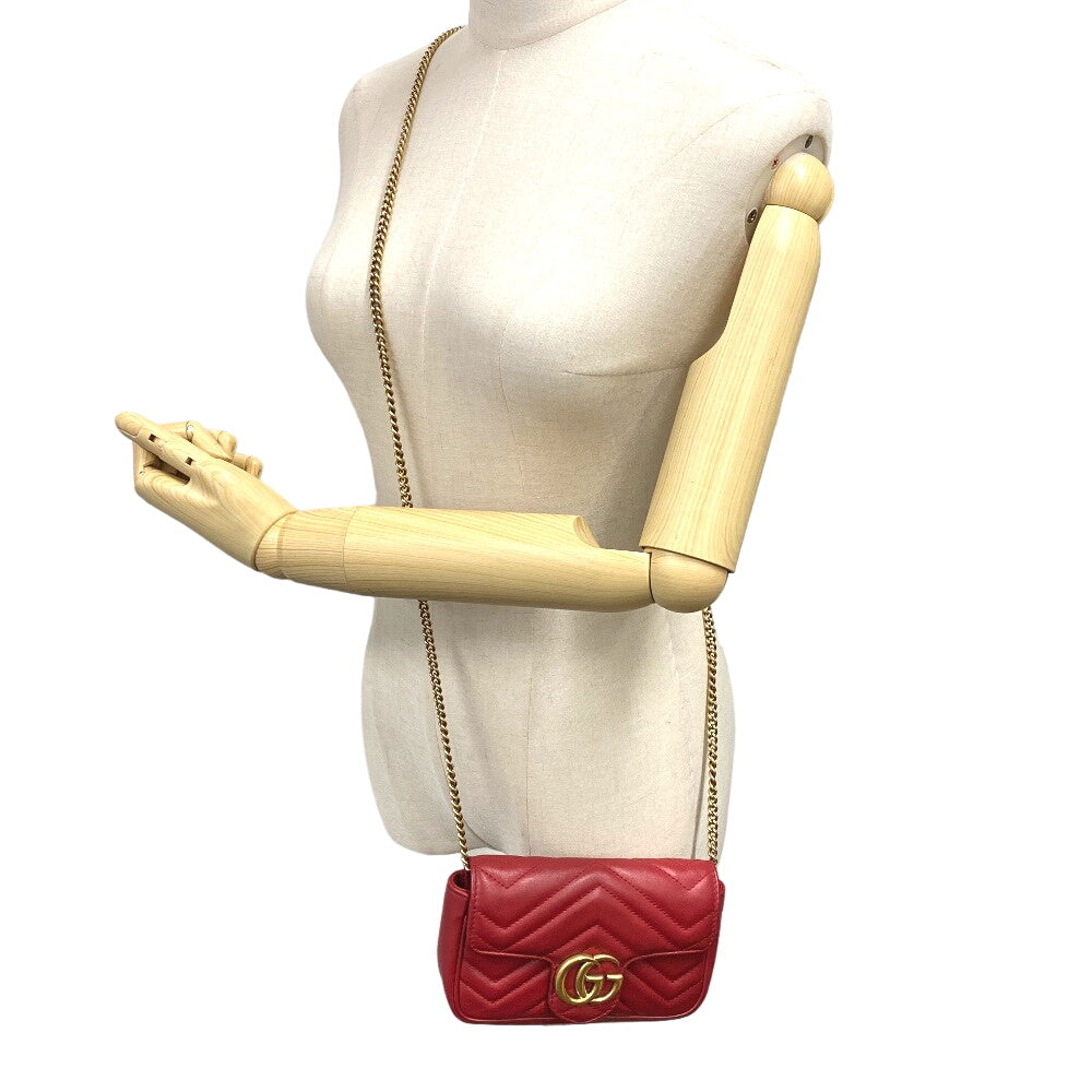 on model Gucci Matelasse Marmont Super Mini GG Hibiscus Red Crossbody