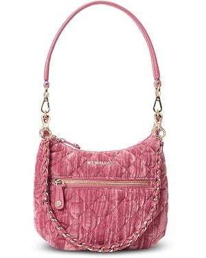 A pink quilted leather shoulder bag with a gold-tone chain strap and hardware, shown against a plain white background.