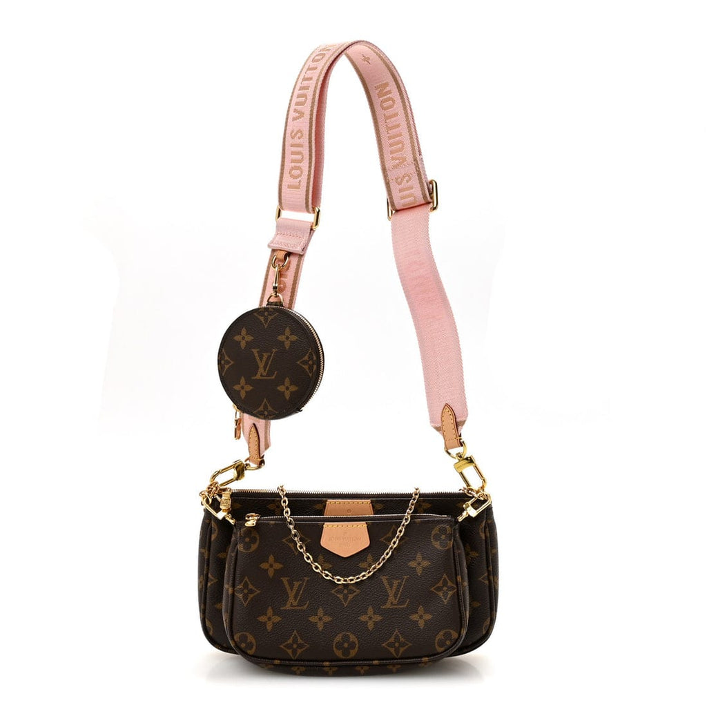 Louis Vuitton handbag with pink strap on a white background