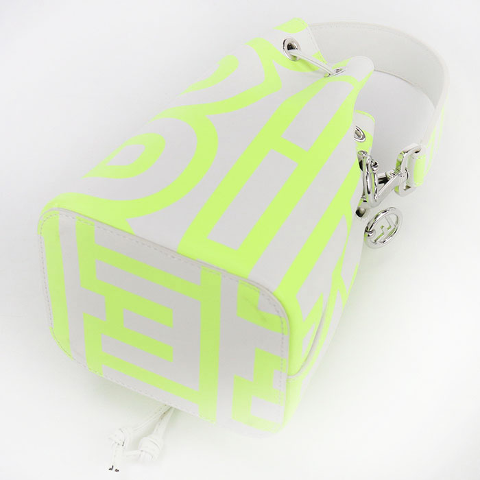 Neon green geometric patterned pouch with silver zipper on a white background