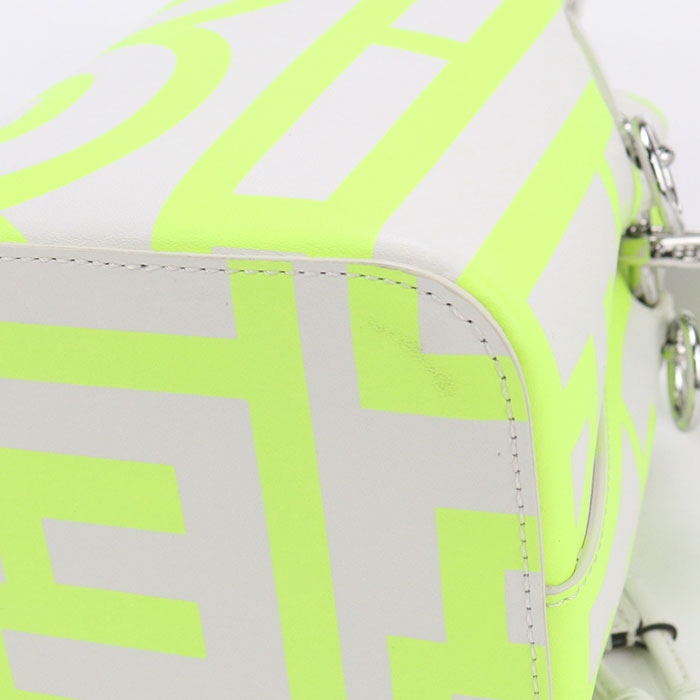Close-up of a bag with neon green and gray design