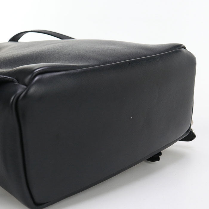 Black leather bag on a white background