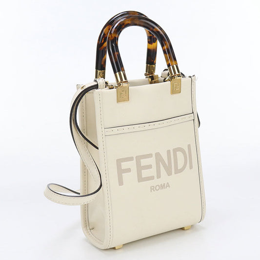 Fendi handbag with tortoiseshell handles on a white background